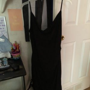This is a black dress. It has not been worn.